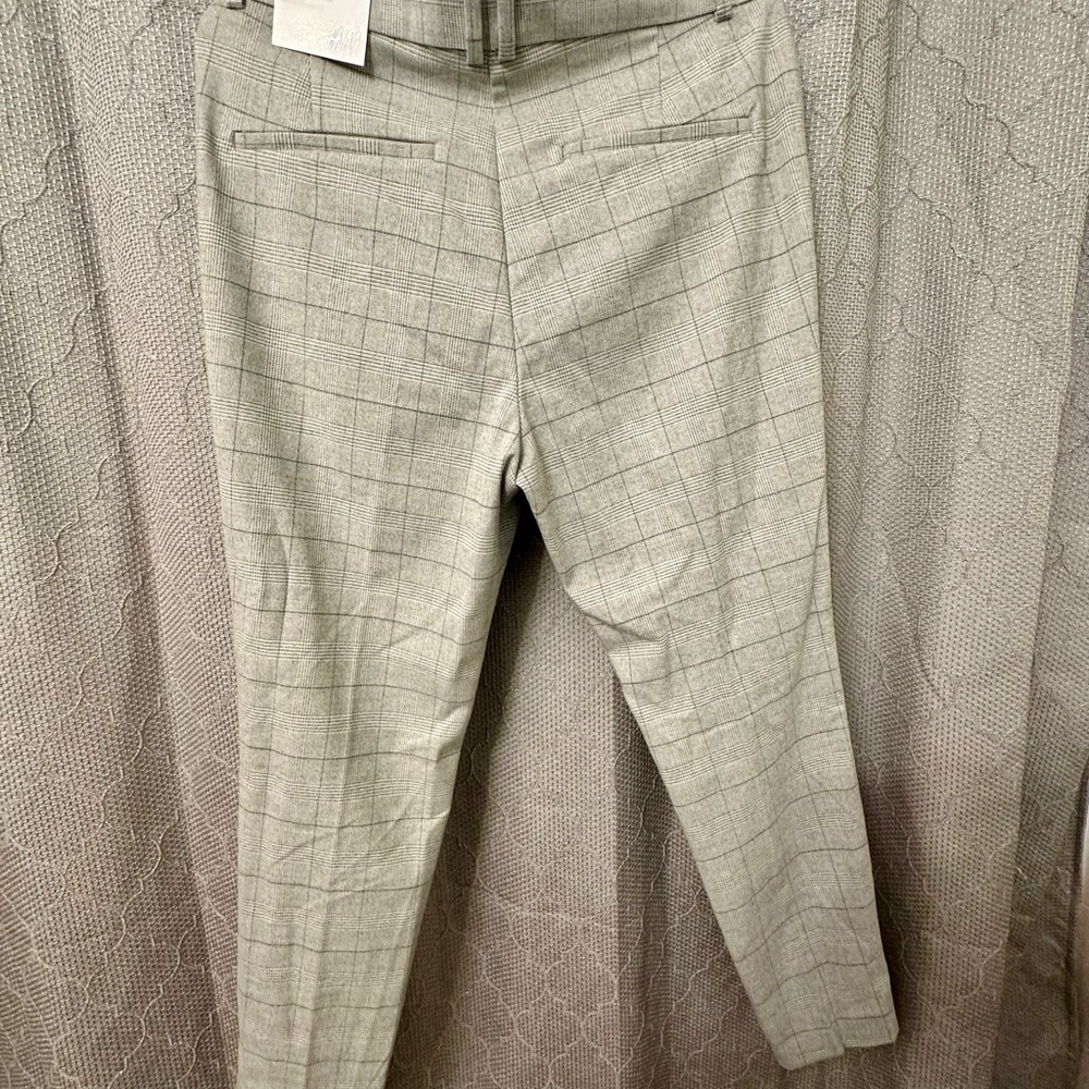 Women matching jacket & pant suit. Brand new with tags.